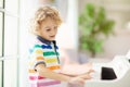 Child playing piano. Kids play music Royalty Free Stock Photo