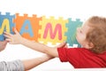 Child playing with puzzle blocks abc alphabet,  object Royalty Free Stock Photo