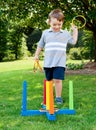 Child playing ring toss