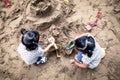 Child playing with sand in playground Royalty Free Stock Photo