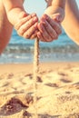 Child playing with sand on sea beach closeup Royalty Free Stock Photo