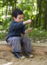 Child playing in sandbox Royalty Free Stock Photo