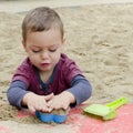 Child playing in sandpit