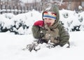 Child playing in snow