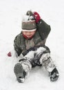 Child playing in snow