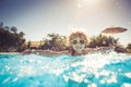 Child playing in swimming pool Royalty Free Stock Photo