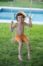 Child playing in a swing Royalty Free Stock Photo