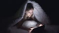 Child Playing Tablet in Dark Night, Girl Browsing Internet in Bed, Not Sleeping