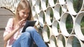 Child Playing Tablet in Park, Little Girl Uses Smartphones Outdoor in Nature Royalty Free Stock Photo