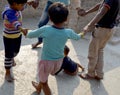 Child playing on their house roof.