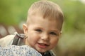 Child is playing. Toddler boy smiling with baby teeth on cute face Royalty Free Stock Photo