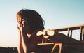 Child playing with toy airplane at sunset. Dreaming boy with wooden plane. Child pilot aviator with airplane dreams of Royalty Free Stock Photo