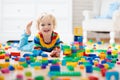 Child playing with toy blocks. Toys for kids Royalty Free Stock Photo