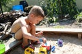 Child playing with toy car Royalty Free Stock Photo