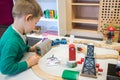 Child playing with toy train Royalty Free Stock Photo