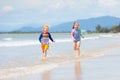 Kids on tropical beach. Children playing at sea Royalty Free Stock Photo