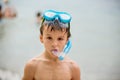 Child playing in the water in the sea, having fun Royalty Free Stock Photo