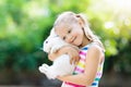 Child with rabbit. Easter bunny. Kids and pets. Royalty Free Stock Photo