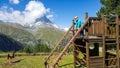 Child playing in the Wolli theme park, Sunnegga Switzerland, is a sunny corner for the whole family at the foot of the Matterhorn