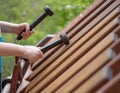 A child plays diatonic large marimba which is placed as a guest attraction in a local park