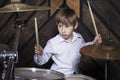 The child plays the drums. Royalty Free Stock Photo