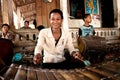 Child Plays Gamelan Instrument