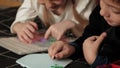 Child plays with perler beads. fine motor development