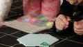 Child plays with perler beads. fine motor development