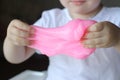 Kid Playing Handmade Toy Called Slime, Selective focus on Slime