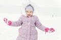 Child plays with snow. winter activities