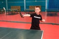 The child plays table tennis professionally. children`s training in table tennis. Shock testing Royalty Free Stock Photo