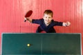 The child plays table tennis Royalty Free Stock Photo