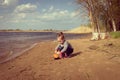 Child plays with toy car truck on the beach Royalty Free Stock Photo