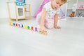 A child plays with a train made of numbers. Selective focus. Royalty Free Stock Photo