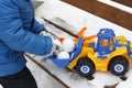 A child plays in the winter outdoors. Royalty Free Stock Photo