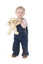 Child with plushy cuddle-bear Royalty Free Stock Photo