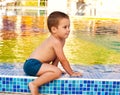 Child on poolside Royalty Free Stock Photo