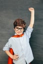 Child portraitCheerful smiling little boy against  chalkboard. Looking at camera. School concept Royalty Free Stock Photo