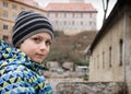 Child portrait in front of historical castle