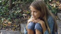 Child Portrait, Kid Smiling at Camera, Thoughtful Happy Girl Outdoor in Park Royalty Free Stock Photo