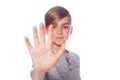 Child portrait, nine years old schoolboy showing numbers five wi Royalty Free Stock Photo