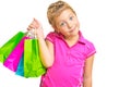 Child portrait with shopping bags in hands Isolated on a white background. Cute little girl holding colored bags in her hands. Royalty Free Stock Photo