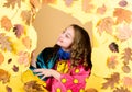 Child in positive mood. season forecast. kid in autumn leaves. little girl in trendy raincoat. little girl in rain Royalty Free Stock Photo