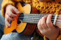 Child practicing guitar chords closeup Royalty Free Stock Photo