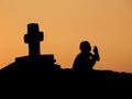 Child, prayer, cross in sunset Royalty Free Stock Photo