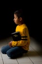 Child Praying with Bible Royalty Free Stock Photo