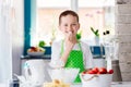 Child preparing sweet dessert and snacking