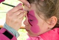 Child preschooler with face painting Royalty Free Stock Photo