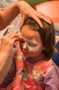 Child preschooler with face painting. Make up. Royalty Free Stock Photo