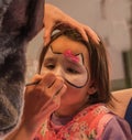Child preschooler with face painting. Make up. Royalty Free Stock Photo